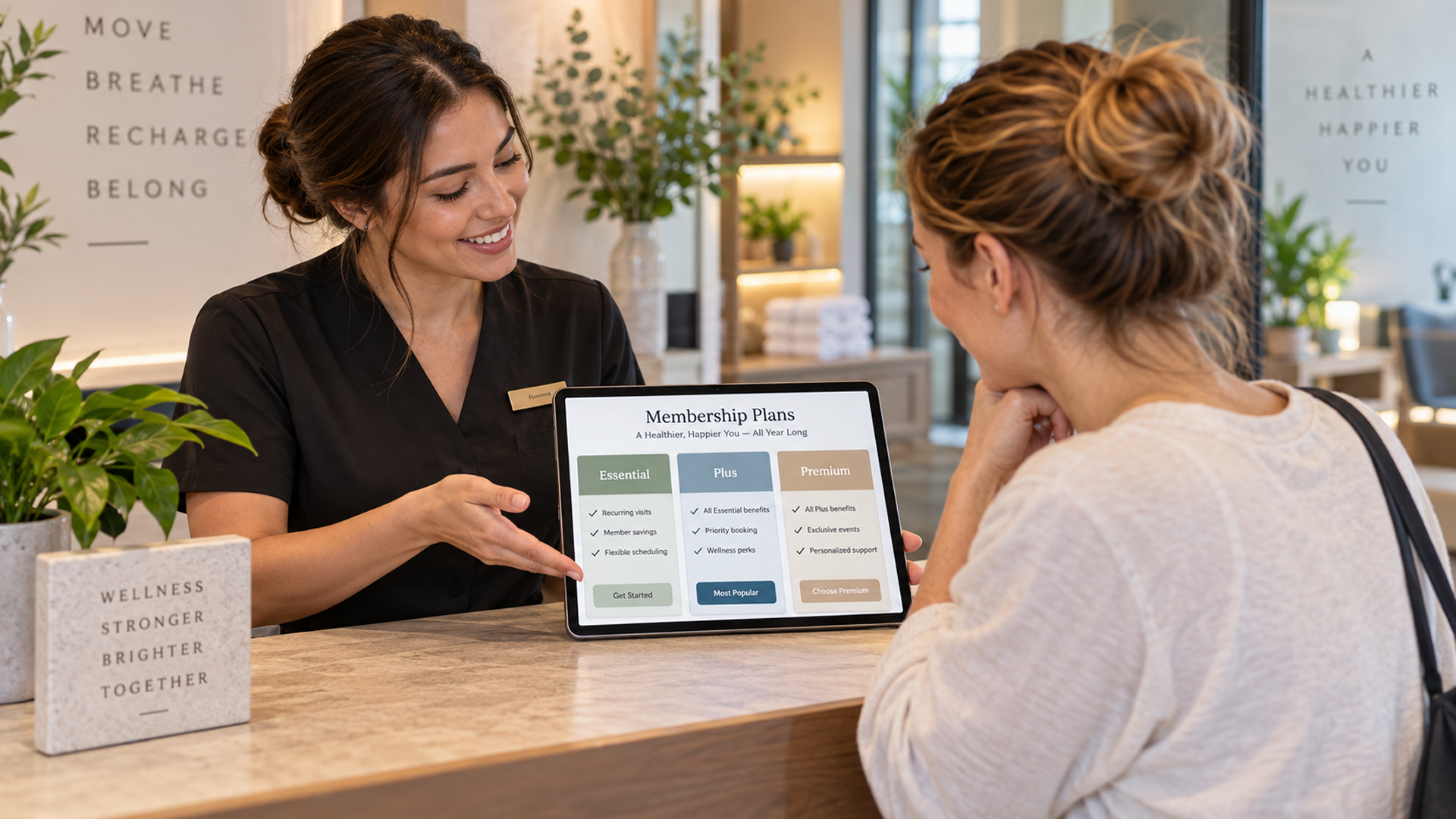 Front Desk At A Wellness Center Displaying Membership Tier Options